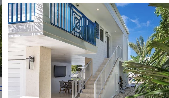 Exterior stairs and blue railings